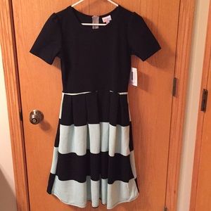 Brand new with tags LuLaRoe Amelia dress.